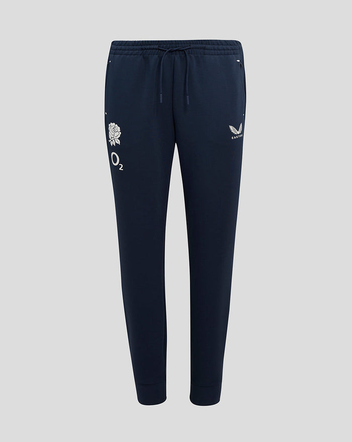 Front view of navy travel knit pant with drawstring waist zip pockets and thigh logos including a white rose and O2.