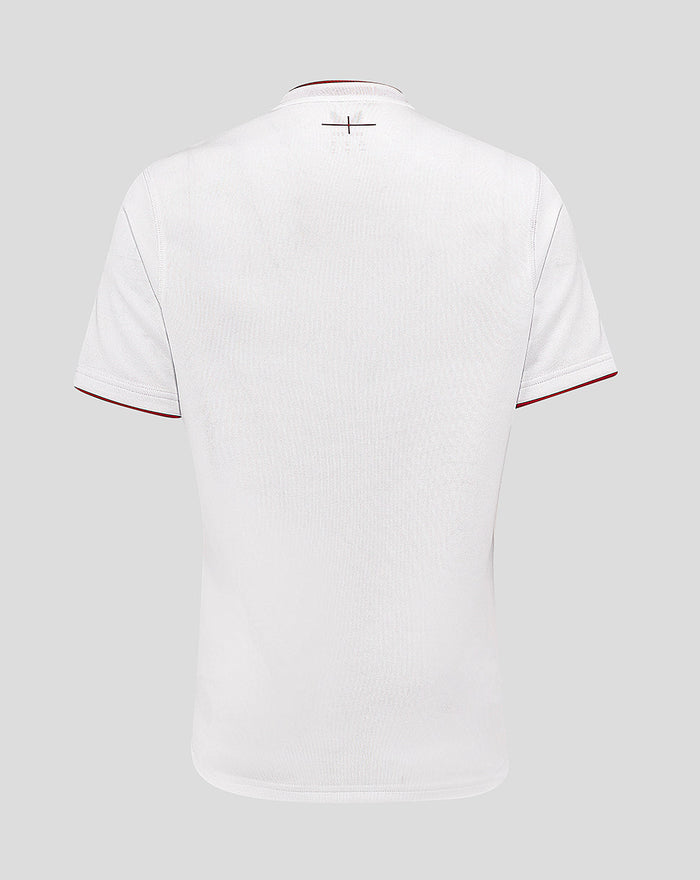 Back view of white England Rugby home shirt with red collar trim and a small cross stitch at the upper back.
