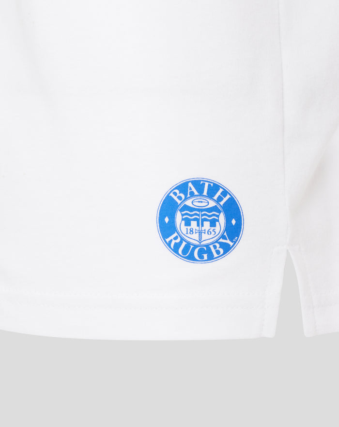 White T shirt with blue Bath Rugby circular logo on the lower front area