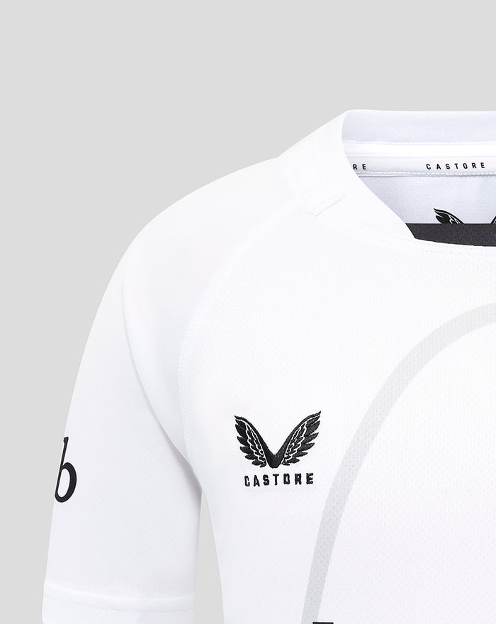 Close up of white Bath Rugby replica shirt chest with Castore logo