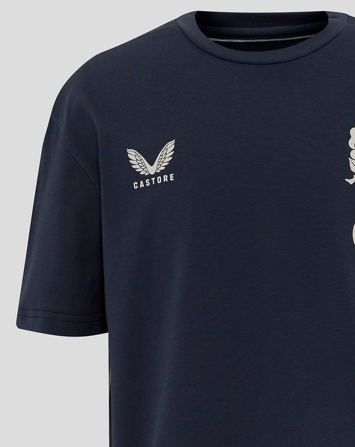 Close up of navy travel T shirt showing Castore logo on left chest and rose crest on right chest