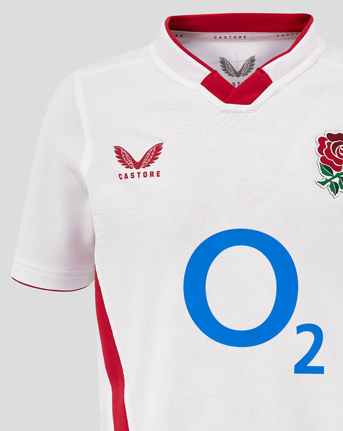 Close up of white jersey front featuring the Rose crest and O2 logo with Castore branding on the chest area.