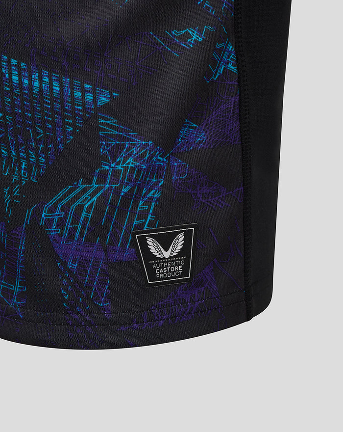 Close up of the geometric blue and purple print on the black England Rugby shirt with Castore authenticity badge