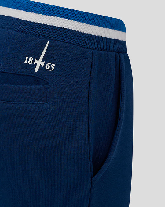 Navy junior classic jogger waistband with blue white striped knit and pocket edge
