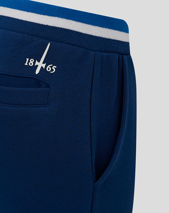 Navy junior classic jogger waistband with blue white striped knit and pocket edge