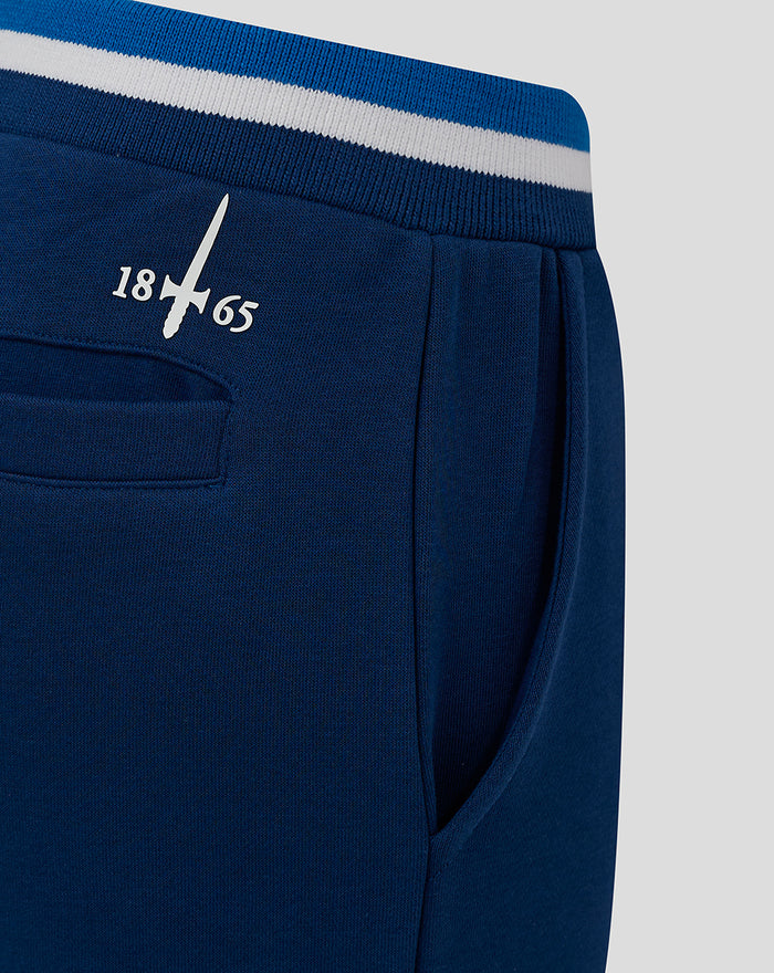 Navy junior classic jogger waistband with blue white striped knit and pocket edge
