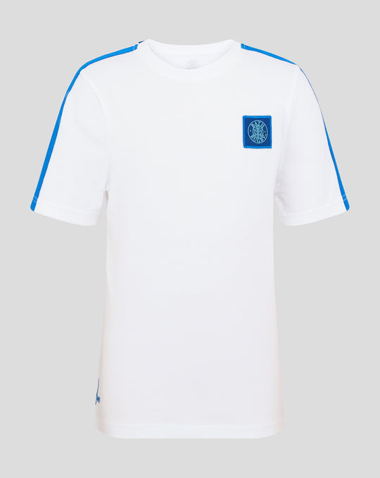 Front view of white junior T shirt with blue shoulder piping and Bath Rugby crest patch on the chest