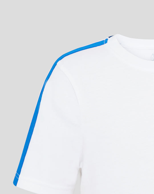 Shoulder area of white cotton T shirt with a prominent blue seam stripe.