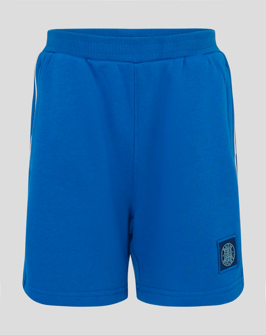 Blue junior classic shorts with a wide ribbed waistband and logo patch on the lower leg