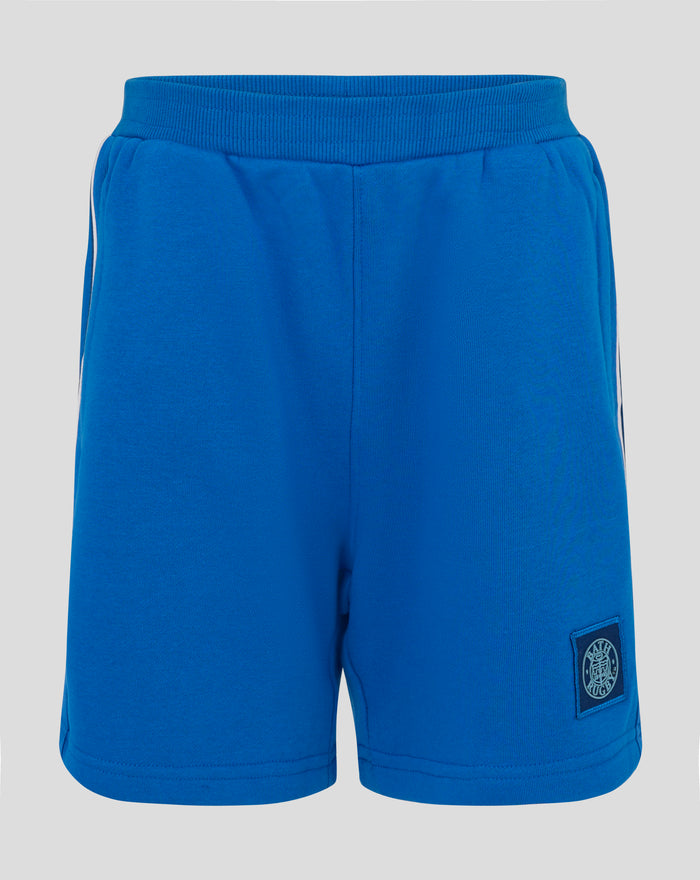 Blue junior classic shorts with a wide ribbed waistband and logo patch on the lower leg