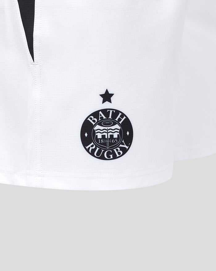 Close up of white Bath Rugby shorts showing a star above the Bath Rugby crest on the left leg