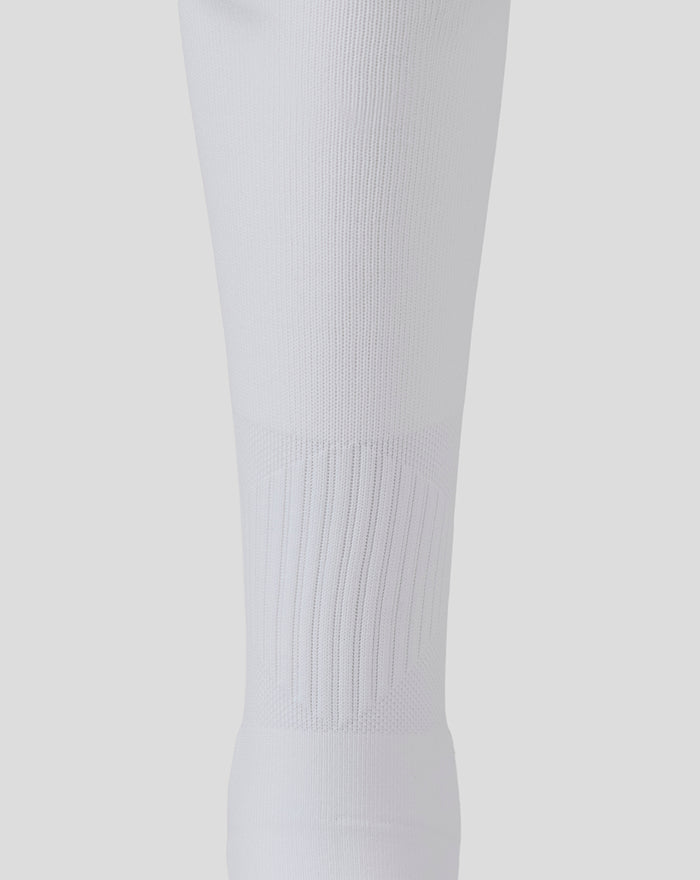 White knee-high athletic sock for adults 25/26 away kit with textured ribbed cuff.
