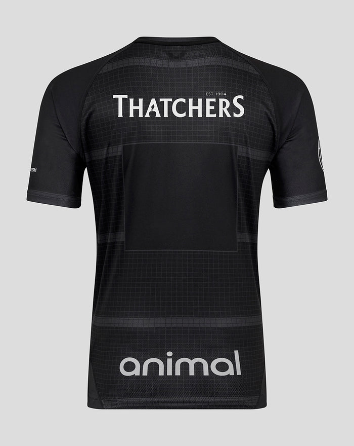 Back view of a black Bath Rugby shirt with Thatchers across the upper back and animal logo near the lower back