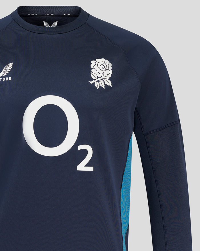 Navy Men's England Rugby long sleeve drill top close up front showing rose crest on left chest, O2 center logo and Castore branding.