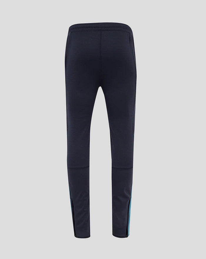 Back view of navy training pants showing slim fit and paneling