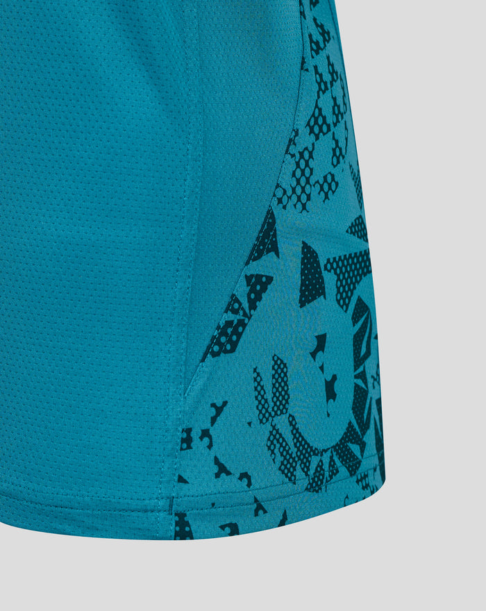 Close up of teal textured fabric and a patterned side panel from a Men’s England Rugby sleeveless top