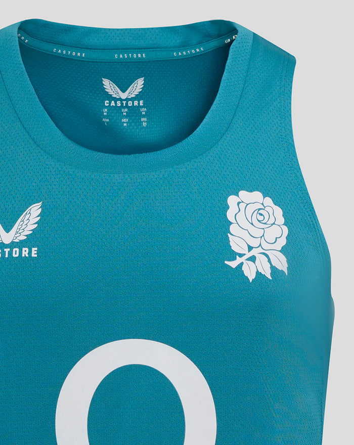 Chest area close-up of storm blue England Rugby sleeveless singlet showing Rose crest on left and Castore logo on right