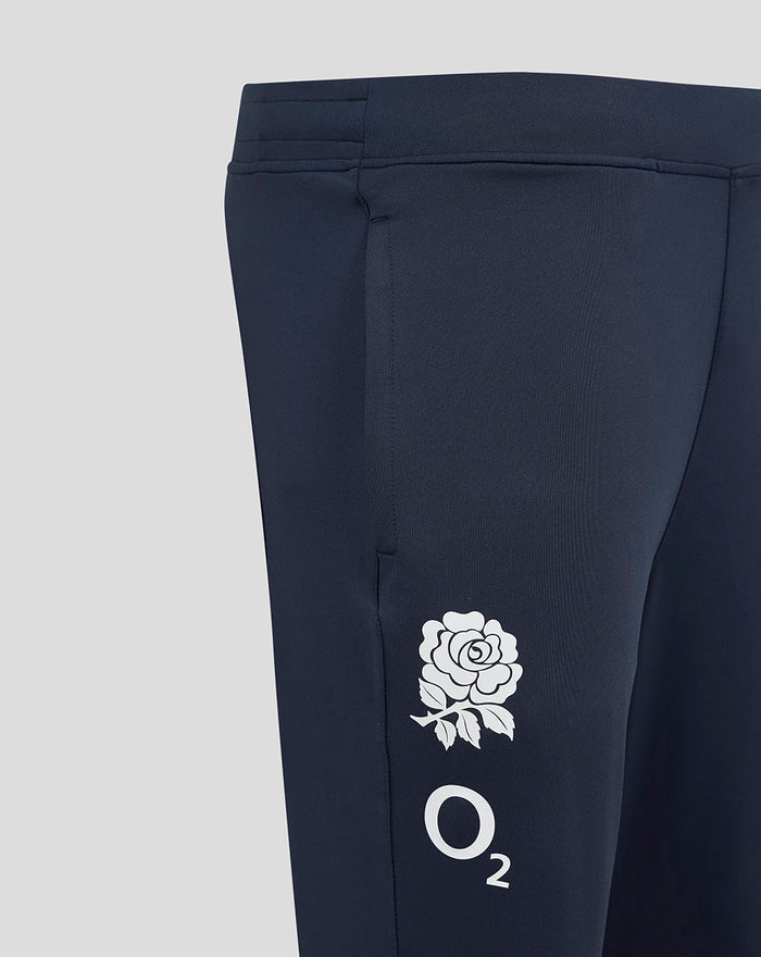 Close-up of navy England Rugby pants leg showing white rose crest above O2 logo