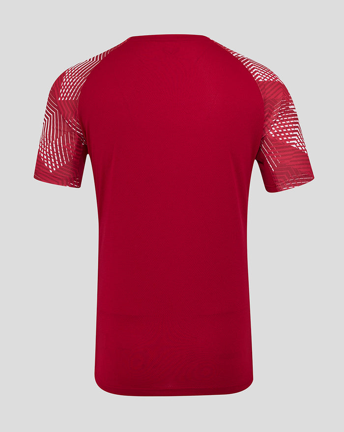 Back view of red England Rugby Pre Match T shirt with bold geometric pattern on the sleeves