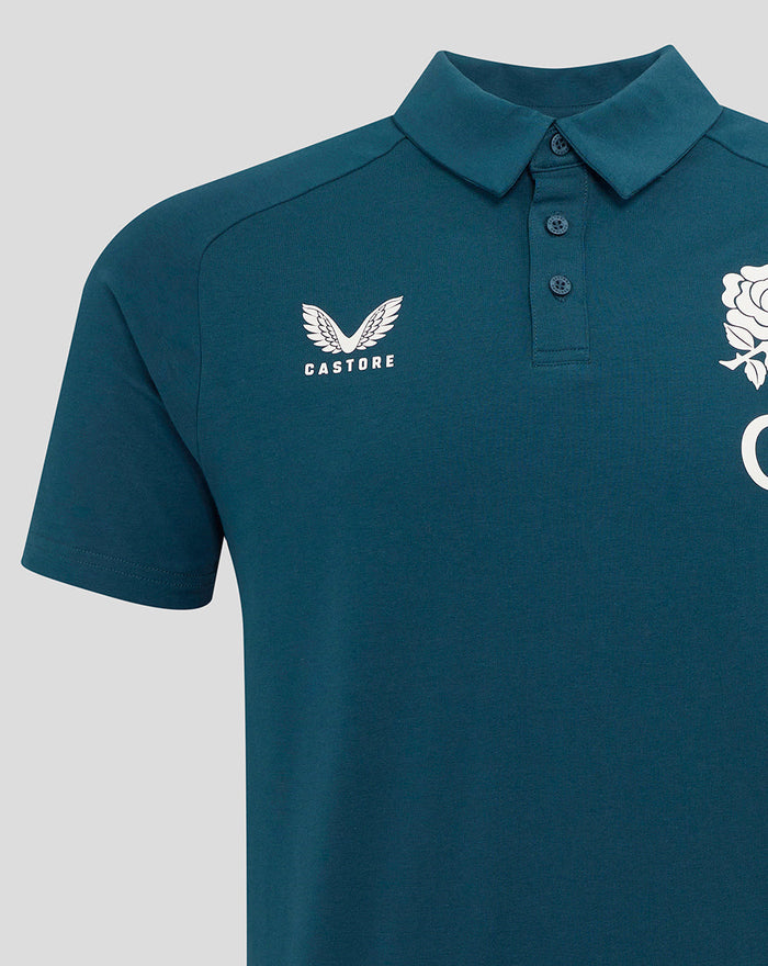 Close-up of chest area on Reflecting Pond polo showing Castore logo on the left and England rose crest on the right