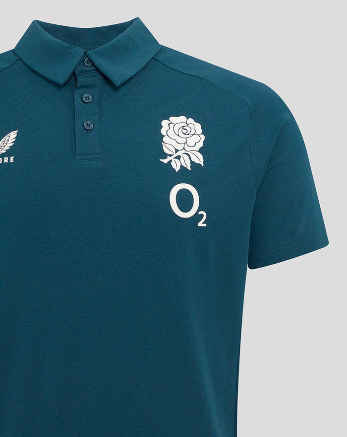 England Rugby travel polo in Reflecting Pond teal with club crest on left chest and Castore branding on right chest