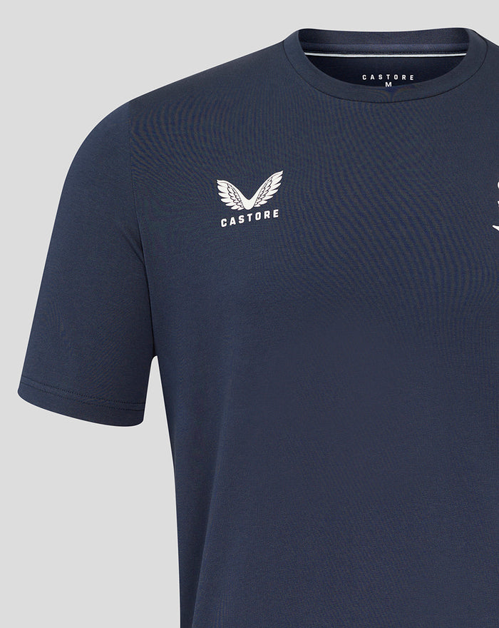 Close up of navy travel tee chest featuring Castore logo on the left
