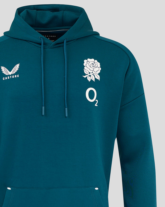 Front view of teal England Rugby travel hoodie with Castore logo on the left chest and a rose with O2 on the right chest.