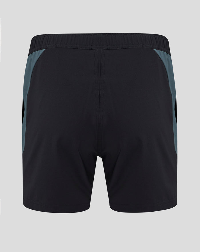 Back view of black Bath Rugby training shorts with blue side panels and teal Bath Rugby crest at the hem.