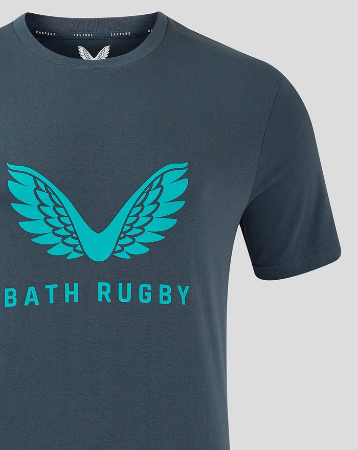 Close up of front chest on dark slate shirt featuring turquoise wing logo and Bath Rugby text