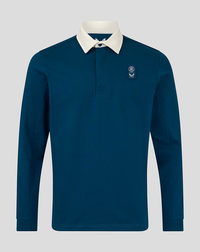 Front view of teal Junior Lifestyle Rugby Shirt with white collar and left chest badge.